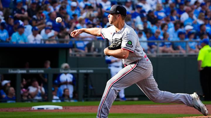 Mar 30, 2026; Kansas City, Missouri, USA; Minnesota Twins pitcher Justin Topa (48) delivers a warm up pitch against the Kansas City Royals during the game at Kauffman Stadium. Mandatory Credit: Denny Medley-Imagn Images