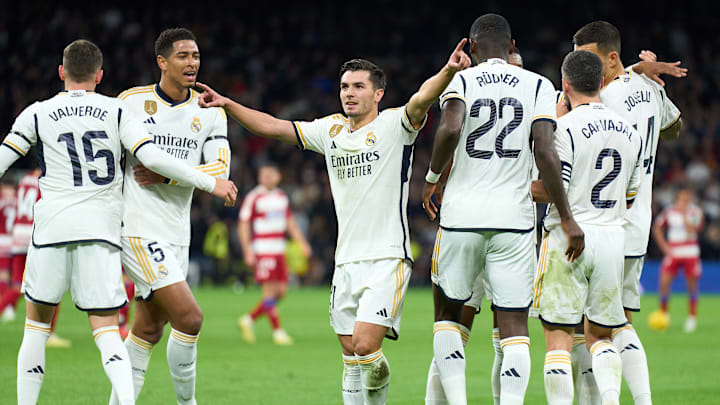 Real Madrid regained top spot with the victory over cellar-dwelling Granada.