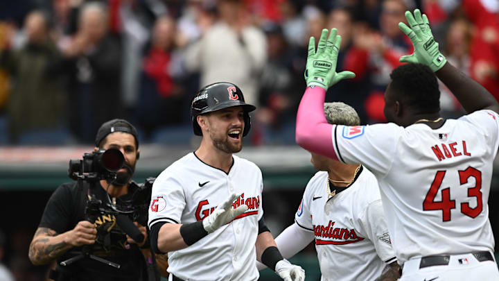 Oct 12, 2024; Cleveland, Ohio, USA; Cleveland Guardians outfielder Lane Thomas (8) celebrates with outfielder Jhonkensy Noel (43) in the fifth inning against the Detroit Tigers during game five of the ALDS for the 2024 MLB Playoffs at Progressive Field. Mandatory Credit: Ken Blaze-Imagn Images