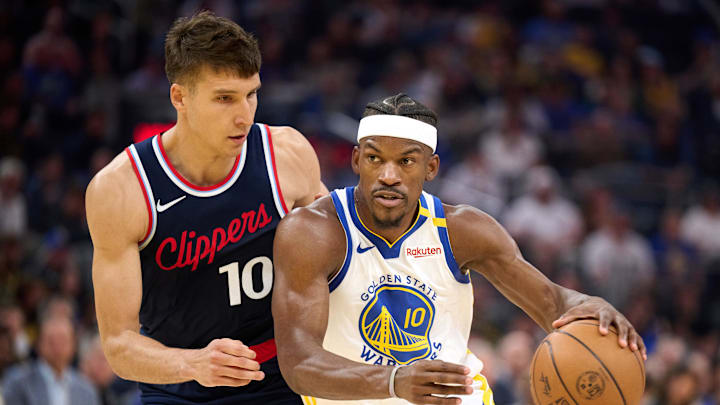 Apr 13, 2025; San Francisco, California, USA; Golden State Warriors forward Jimmy Butler III (10) drives with the ball against LA Clippers guard Bogdan Bogdanovic (10) during the first quarter at Chase Center. Mandatory Credit: Robert Edwards-Imagn Images Apr 13, 2025; San Francisco, California, USA; Golden State Warriors forward Jimmy Butler III (10) drives with the ball against LA Clippers guard Bogdan Bogdanovic (10) during the first quarter at Chase Center. Mandatory Credit: Robert Edwards-Imagn Images