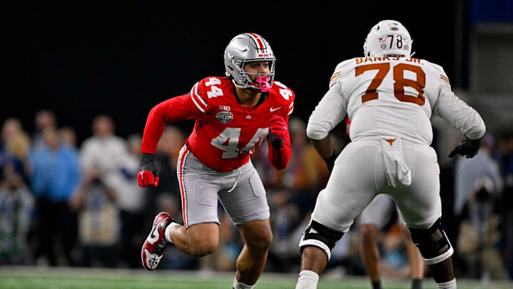 Jan 10, 2025; Arlington, TX, USA; Ohio State Buckeyes defensive end JT Tuimoloau (44) and Texas Longhorns offensive lineman Kelvin Banks Jr. (78) in action during the game between the Texas Longhorns and the Ohio State Buckeyes at AT&T Stadium. Mandatory Credit: Jerome Miron-Imagn Images