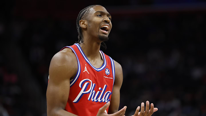 Feb 7, 2025; Detroit, Michigan, USA;  Philadelphia 76ers guard Tyrese Maxey (0) reacts in the first half against the Detroit Red Wings at Little Caesars Arena. Mandatory Credit: Rick Osentoski-Imagn Images
