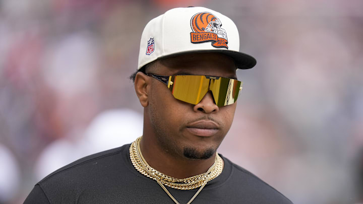 Aug 17, 2024; Chicago, Illinois, USA; Cincinnati Bengals offensive tackle Orlando Brown Jr. (75) walks the sideline during the first quarter of the NFL Preseason Week 2 game between the Chicago Bears and the Cincinnati Bengals at Soldier Field. Mandatory Credit: Sam Greene-Imagn Images