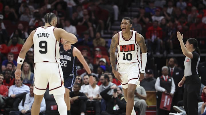 Mar 10, 2025; Houston, Texas, USA; Houston Rockets forward Jabari Smith Jr. (10) reacts after scoring a basket during the fourth quarter against the Orlando Magic at Toyota Center. Mandatory Credit: Troy Taormina-Imagn Images