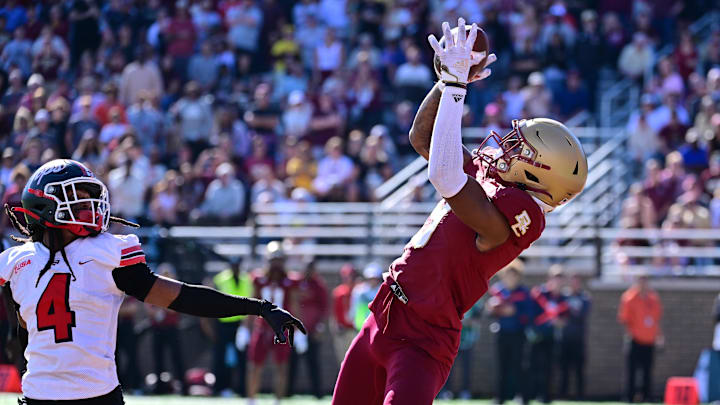 Sep 28, 2024; Chestnut Hill, Massachusetts, USA; Boston College Eagles wide receiver Jerand Bradley (9) makes a catch in the end zone for a touchdown against the Western Kentucky Hilltoppers during the second half at Alumni Stadium. Mandatory Credit: Eric Canha-Imagn Images Sep 28, 2024; Chestnut Hill, Massachusetts, USA; Boston College Eagles wide receiver Jerand Bradley (9) makes a catch in the end zone for a touchdown against the Western Kentucky Hilltoppers during the second half at Alumni Stadium. Mandatory Credit: Eric Canha-Imagn Images