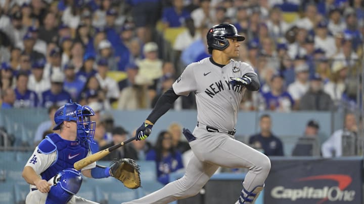 New York Yankees outfielder Juan Soto (22) hits a single in the sixth inning against the Los Angeles Dodgers during game one of the 2024 MLB World Series at Dodger Stadium on Oct 25.