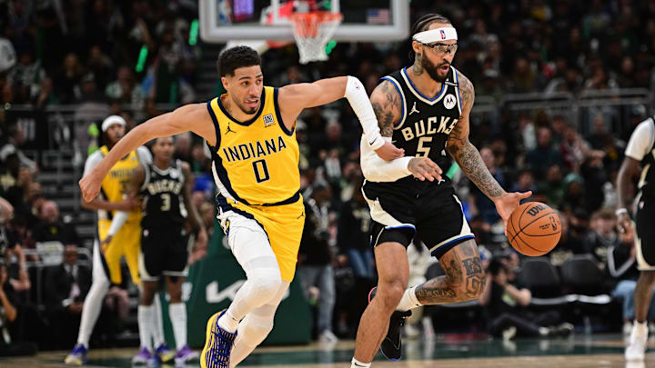 Apr 27, 2025; Milwaukee, Wisconsin, USA; Milwaukee Bucks guard Gary Trent Jr. (5) drives for the basket against Indiana Pacers guard Tyrese Haliburton (0) in the third quarter during game four of first round for the 2024 NBA Playoffs at Fiserv Forum. Mandatory Credit: Benny Sieu-Imagn Images Apr 27, 2025; Milwaukee, Wisconsin, USA; Milwaukee Bucks guard Gary Trent Jr. (5) drives for the basket against Indiana Pacers guard Tyrese Haliburton (0) in the third quarter during game four of first round for the 2024 NBA Playoffs at Fiserv Forum. Mandatory Credit: Benny Sieu-Imagn Images
