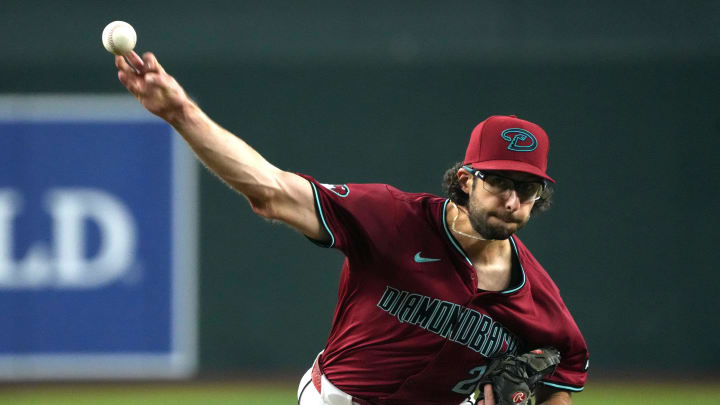 Jun 29, 2024; Phoenix, Arizona, USA; Arizona Diamondbacks pitcher Zac Gallen (23) throws against the Oakland Athletics in the first inning at Chase Field. Mandatory Credit: Rick Scuteri-USA TODAY Sports