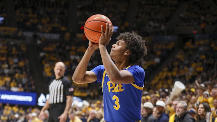 Nov 13, 2025; Morgantown, West Virginia, USA; Pittsburgh Panthers guard Brandin Cummings (3) shoots a three pointer during the first half against the West Virginia Mountaineers at WVU Coliseum. Mandatory Credit: Ben Queen-Imagn Images Nov 13, 2025; Morgantown, West Virginia, USA; Pittsburgh Panthers guard Brandin Cummings (3) shoots a three pointer during the first half against the West Virginia Mountaineers at WVU Coliseum. Mandatory Credit: Ben Queen-Imagn Images