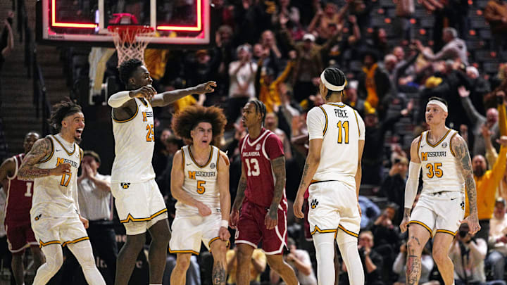 Jan 24, 2026; Columbia, Missouri, USA; The Missouri Tigers celebrate with forward Trent Pierce (11) after a game-tying shot at the buzzer to send the game to overtime against the Oklahoma Sooners at Mizzou Arena. Mandatory Credit: Jay Biggerstaff-Imagn Images