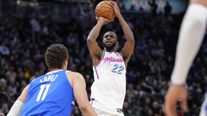 Feb 23, 2025; Milwaukee, Wisconsin, USA; Miami Heat forward Andrew Wiggins (22) shoots over Milwaukee Bucks center Brook Lopez (11) during the third quarter at Fiserv Forum. Mandatory Credit: Jeff Hanisch-Imagn Images Feb 23, 2025; Milwaukee, Wisconsin, USA; Miami Heat forward Andrew Wiggins (22) shoots over Milwaukee Bucks center Brook Lopez (11) during the third quarter at Fiserv Forum. Mandatory Credit: Jeff Hanisch-Imagn Images