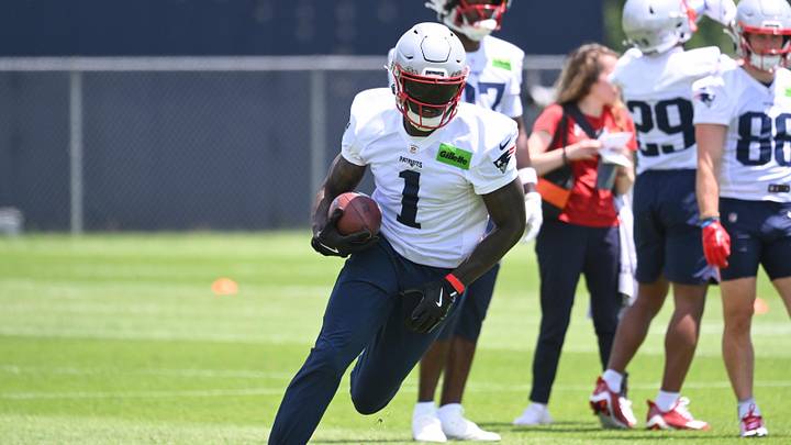Jun 2, 2026; Foxborough, MA, USA; New England Patriots wide receiver A.J. Brown (1) runs after making a catch during the team's OTA at Gillette Stadium. Mandatory Credit: Eric Canha-Imagn Images