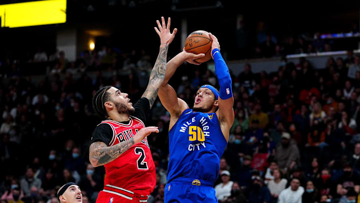 Nov 19, 2021; Denver, Colorado, USA; Denver Nuggets forward Aaron Gordon (50) shoots the ball over Chicago Bulls guard Lonzo Ball (2) in the third quarter at Ball Arena. Mandatory Credit: Ron Chenoy-Imagn Images