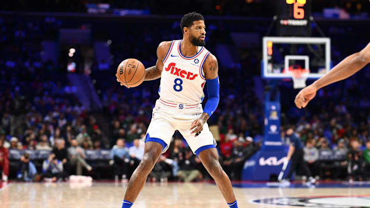 Feb 11, 2025; Philadelphia, Pennsylvania, USA; Philadelphia 76ers forward Paul George (8) controls the ball against the Toronto Raptors in the first quarter at Wells Fargo Center. Mandatory Credit: Kyle Ross-Imagn Images