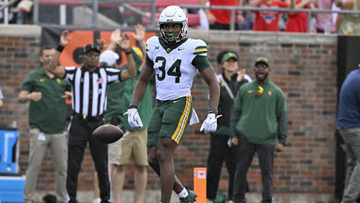 Baylor Bears wide receiver Josh Cameron (34) celebrates after scoring a touchdown against the SMU Mustangs during the second quarter at Gerald J. Ford Stadium