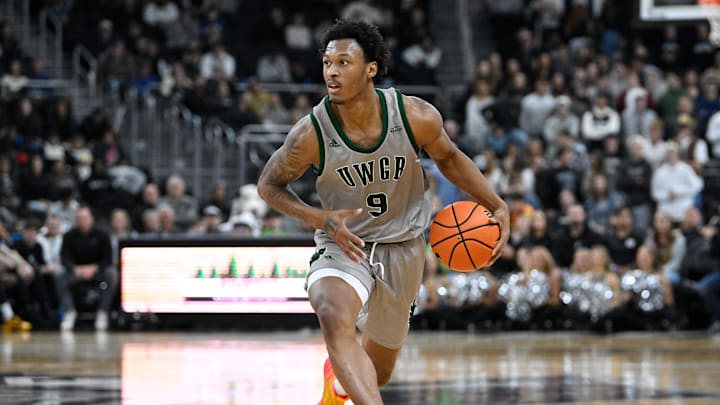 Nov 16, 2024; Providence, Rhode Island, USA; Green Bay Phoenix guard Anthony Roy (9) dribbles the ball against the Providence Friars during the second half at Amica Mutual Pavilion. Mandatory Credit: Eric Canha-Imagn Images