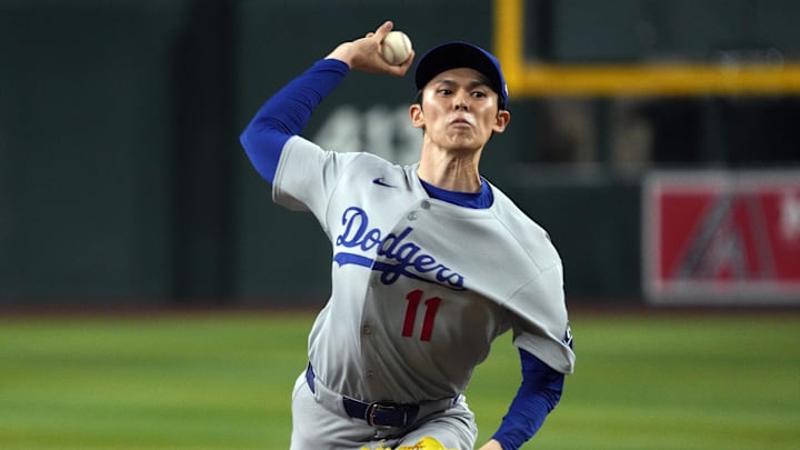 Sep 24, 2025; Phoenix, Arizona, USA; Los Angeles Dodgers pitcher Roki Sasaki throws against the Arizona Diamondbacks in the seventh inning at Chase Field. Mandatory Credit: Rick Scuteri-Imagn Images