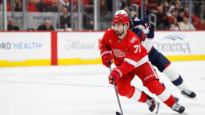 Apr 7, 2026; Detroit, Michigan, USA;  Detroit Red Wings center Dylan Larkin (71) skates with the puck in overtime against the Columbus Blue Jackets at Little Caesars Arena. Mandatory Credit: Rick Osentoski-Imagn Images