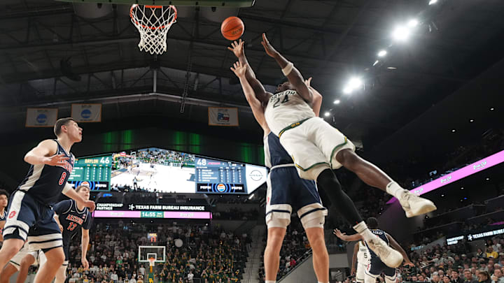 Feb 24, 2026; Waco, Texas, USA; Baylor Bears guard Tounde Yessoufou (24) scores a basket against Arizona Wildcats guard Anthony Dell'orso (3) during the second half at Paul and Alejandra Foster Pavilion. Mandatory Credit: Chris Jones-Imagn Images Feb 24, 2026; Waco, Texas, USA; Baylor Bears guard Tounde Yessoufou (24) scores a basket against Arizona Wildcats guard Anthony Dell'orso (3) during the second half at Paul and Alejandra Foster Pavilion. Mandatory Credit: Chris Jones-Imagn Images