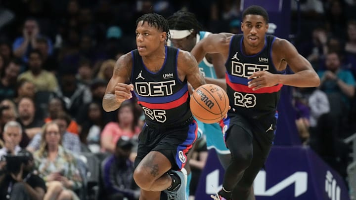 Oct 27, 2023; Charlotte, North Carolina, USA; Detroit Pistons guard Marcus Sasser (25) brings the ball up court with guard Jaden Ivey (23) against the Charlotte Hornets during the second half at Spectrum Center. Mandatory Credit: Jim Dedmon-Imagn Images