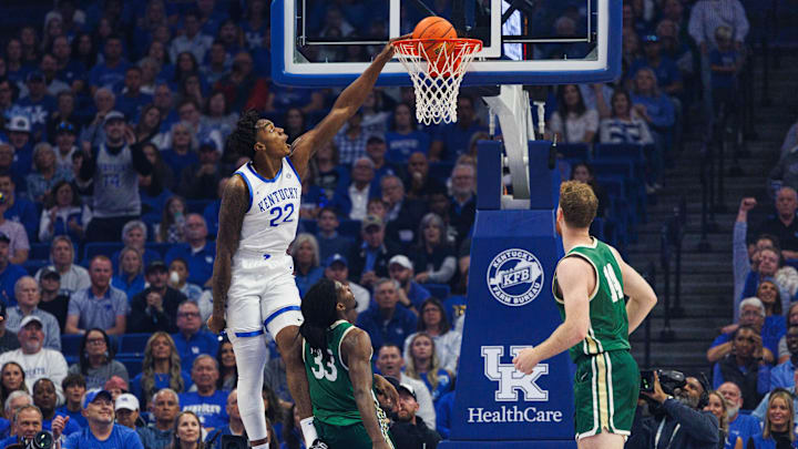 Nov 4, 2024; Lexington, Kentucky, USA; Kentucky Wildcats center Amari Williams (22) dunks the ball during the first half against the Wright State Raiders at Rupp Arena at Central Bank Center. Mandatory Credit: Jordan Prather-Imagn Images