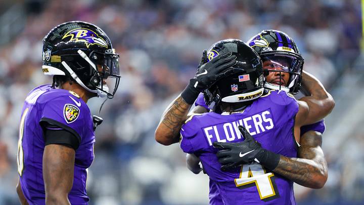 Sep 22, 2024; Arlington, Texas, USA; Baltimore Ravens wide receiver Rashod Bateman (7) celebrates with Baltimore Ravens wide receiver Zay Flowers (4) and Baltimore Ravens quarterback Lamar Jackson (8) after catching a touchdown during the second quarter at AT&T Stadium. Mandatory Credit: Kevin Jairaj-Imagn Images Sep 22, 2024; Arlington, Texas, USA; Baltimore Ravens wide receiver Rashod Bateman (7) celebrates with Baltimore Ravens wide receiver Zay Flowers (4) and Baltimore Ravens quarterback Lamar Jackson (8) after catching a touchdown during the second quarter at AT&T Stadium. Mandatory Credit: Kevin Jairaj-Imagn Images