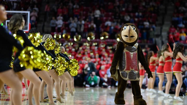 Feb 16, 2025; College Park, Maryland, USA; Maryland Terrapins cheerleaders and mascot perform prior to the game between the Maryland Terrapins and the Iowa Hawkeyes at Xfinity Center. Mandatory Credit: Reggie Hildred-Imagn Images