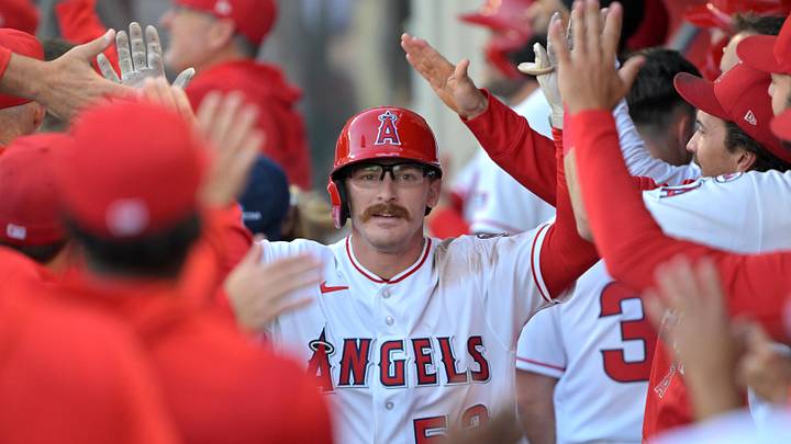 May 22, 2026; Anaheim, California, USA;  Los Angeles Angels left fielder Wade Meckler (53) is congratulated in the dugout after hitting a three-run home run during the second inning against the Texas Rangers at Angel Stadium. Mandatory Credit: Jayne Kamin-Oncea-Imagn Images