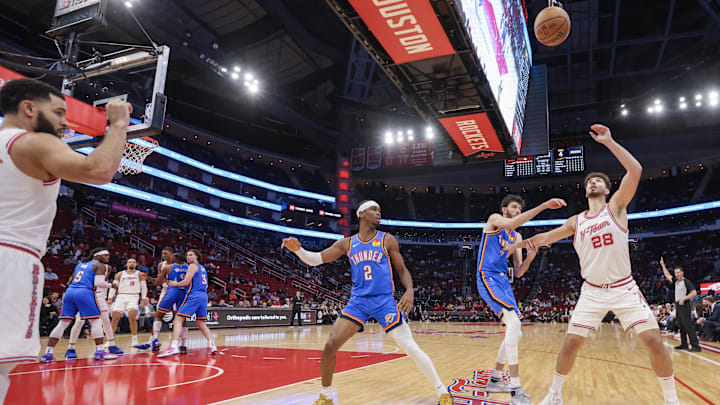 Dec 6, 2023; Houston, Texas, USA; Houston Rockets guard Fred VanVleet (5) inbounds the pass to center Alperen Sengun (28) against Oklahoma City Thunder forward Chet Holmgren (7) in the first quarter at Toyota Center. Mandatory Credit: Thomas Shea-Imagn Images Dec 6, 2023; Houston, Texas, USA; Houston Rockets guard Fred VanVleet (5) inbounds the pass to center Alperen Sengun (28) against Oklahoma City Thunder forward Chet Holmgren (7) in the first quarter at Toyota Center. Mandatory Credit: Thomas Shea-Imagn Images