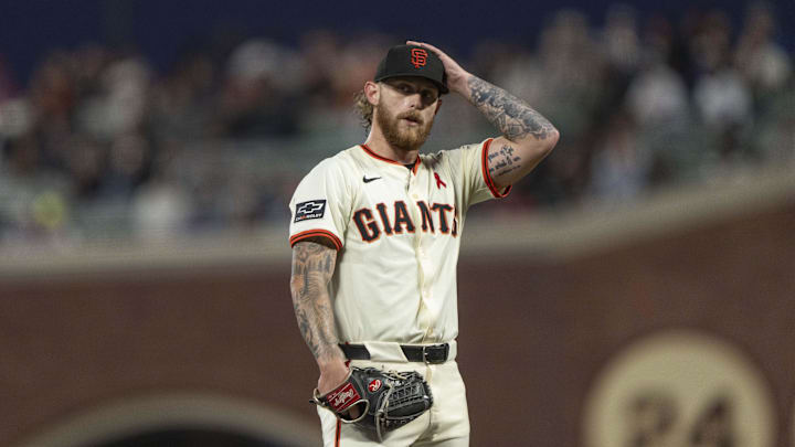Aug 27, 2025; San Francisco, California, USA;  San Francisco Giants pitcher Carson Whisenhunt (88) reacts during the fourth inning against the Chicago Cubs at Oracle Park. Mandatory Credit: Stan Szeto-Imagn Images