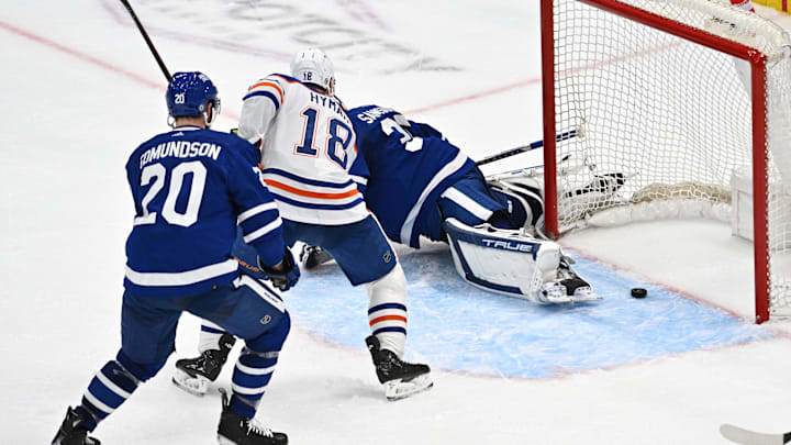 Mar 23, 2024; Toronto, Ontario, CAN; Edmonton Oilers forward Zach Hyman (18) and Toronto Maple Leafs