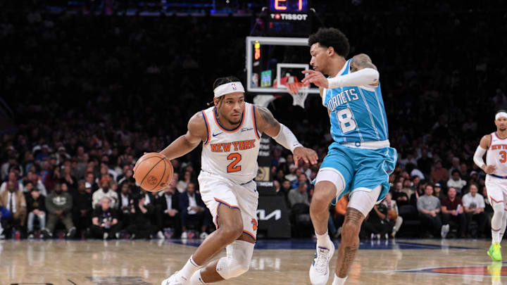 Dec 5, 2024; New York, New York, USA; New York Knicks guard Miles McBride (2) drives to the basket while being defended by Charlotte Hornets guard Nick Smith Jr. (8) during the second half at Madison Square Garden. Mandatory Credit: John Jones-Imagn Images Dec 5, 2024; New York, New York, USA; New York Knicks guard Miles McBride (2) drives to the basket while being defended by Charlotte Hornets guard Nick Smith Jr. (8) during the second half at Madison Square Garden. Mandatory Credit: John Jones-Imagn Images