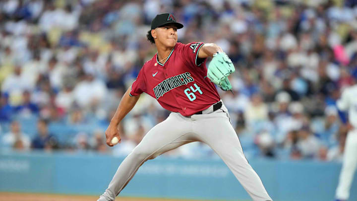 Jul 3, 2024; Los Angeles, California, USA; Arizona Diamondbacks starting pitcher Cristian Mena (64) throws in the second inning against the Los Angeles Dodgers at Dodger Stadium. Mandatory Credit: Kirby Lee-Imagn Images