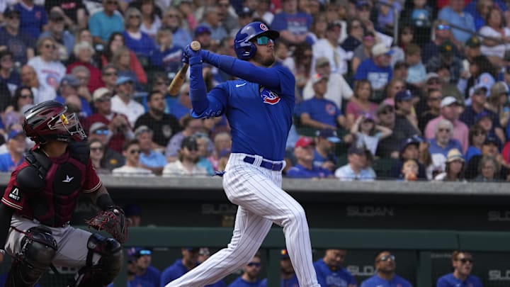 Mar 16, 2023; Mesa, Arizona, USA; Chicago Cubs center fielder Cody Bellinger (24) hits against the Mar 16, 2023; Mesa, Arizona, USA; Chicago Cubs center fielder Cody Bellinger (24) hits against the
