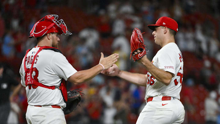 Jul 24, 2025; St. Louis, Missouri, USA;  St. Louis Cardinals relief pitcher Ryan Helsley (56) celebrates with catcher Pedro Pages (43) after the Cardinals defeated the San Diego Padres at Busch Stadium. Mandatory Credit: Jeff Curry-Imagn Images