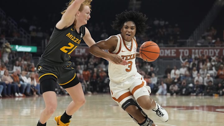 Jan 30, 2025; Austin, Texas, USA; Texas Longhorns guard Rori Harmon (3) drives to the basket against the Missouri Tigers guard Averi Kroenke (21) during the first half at Moody Center. Mandatory Credit: Scott Wachter-Imagn Images