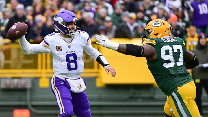 Oct 29, 2023; Green Bay, Wisconsin, USA; Minnesota Vikings quarterback Kirk Cousins (8) gets pressured against Green Bay Packers - Benny Sieu/USA Today Sports