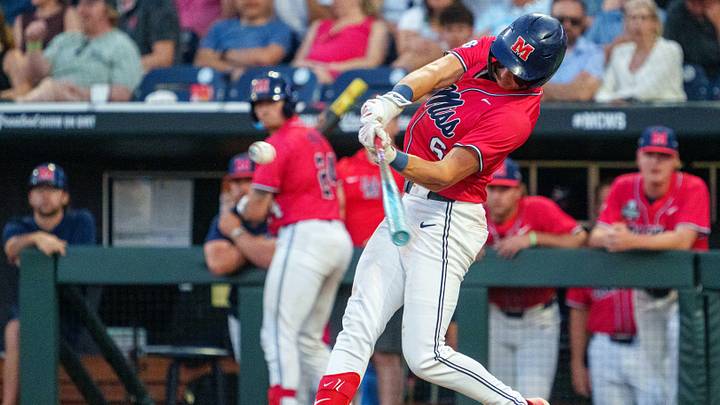 Jun 12, 2026; Omaha, NE, USA; Mississippi Rebels shortstop Owen Paino (6) hits a single against the North Carolina Tar Heels during the eighth inning at Charles Schwab Field. Mandatory Credit: Dylan Widger-Imagn Images Jun 12, 2026; Omaha, NE, USA; Mississippi Rebels shortstop Owen Paino (6) hits a single against the North Carolina Tar Heels during the eighth inning at Charles Schwab Field. Mandatory Credit: Dylan Widger-Imagn Images