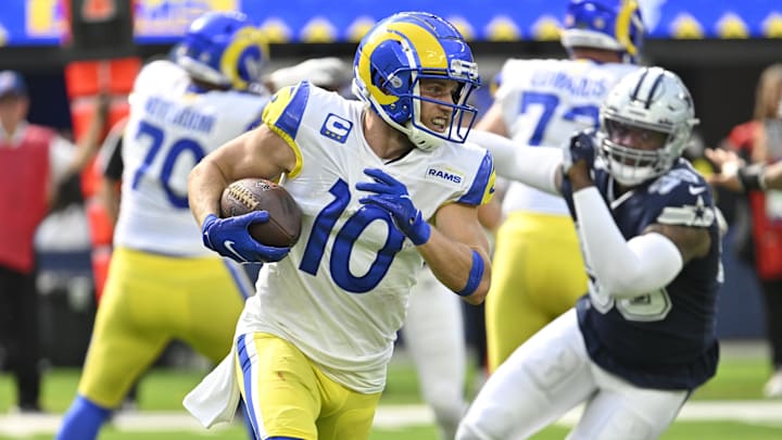 Oct 9, 2022; Inglewood, California, USA; Los Angeles Rams wide receiver Cooper Kupp (10) carries the ball during the second quarter against the Dallas Cowboys at SoFi Stadium. Mandatory Credit: Robert Hanashiro-Imagn Images