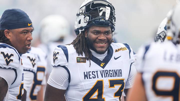 Sep 5, 2026; Morgantown, West Virginia, USA; West Virginia Mountaineers defensive lineman K.J. Henson (43) along the sideline during the fourth quarter against the Coastal Carolina Chanticleers at Milan Puskar Stadium. Mandatory Credit: Ben Queen-Imagn Images