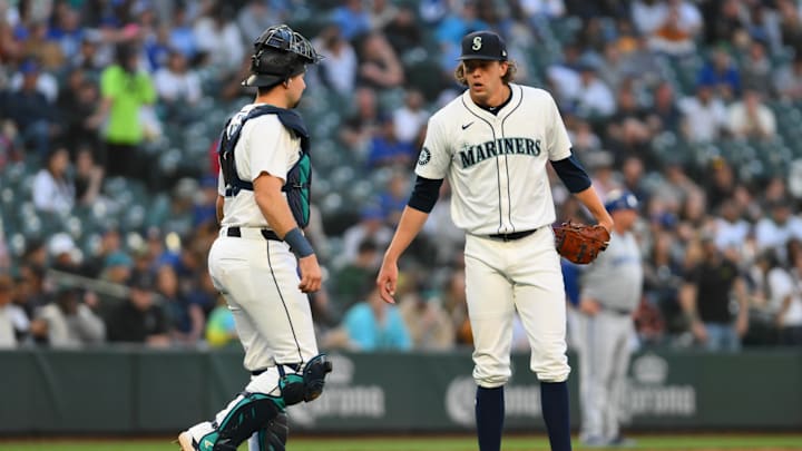 May 14, 2024; Seattle, Washington, USA; Seattle Mariners catcher Cal Raleigh (29) visits starting pitcher Logan Gilbert.
