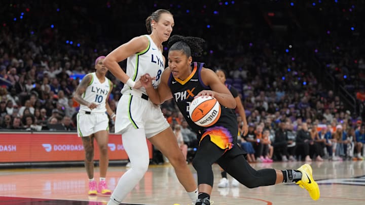 Sep 28, 2025; Phoenix, Arizona, USA; Phoenix Mercury forward Alyssa Thomas (25) drives against Minnesota Lynx forward Alanna Smith (8) in the first half during game four of the second round for the 2025 WNBA Playoffs at PHX Arena. Mandatory Credit: Rick Scuteri-Imagn Images Sep 28, 2025; Phoenix, Arizona, USA; Phoenix Mercury forward Alyssa Thomas (25) drives against Minnesota Lynx forward Alanna Smith (8) in the first half during game four of the second round for the 2025 WNBA Playoffs at PHX Arena. Mandatory Credit: Rick Scuteri-Imagn Images
