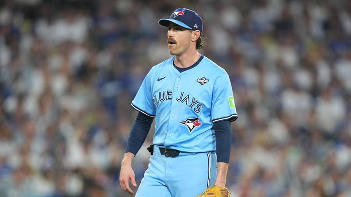 Oct 28, 2025; Los Angeles, California, USA; Toronto Blue Jays pitcher Shane Bieber (57) reacts in the third inning against the Los Angeles Dodgers during game four of the 2025 MLB World Series at Dodger Stadium. Mandatory Credit: Kirby Lee-Imagn Images