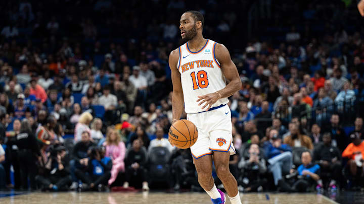 Feb 14, 2024; Orlando, Florida, USA; New York Knicks guard Alec Burks (18) dribbles the ball against