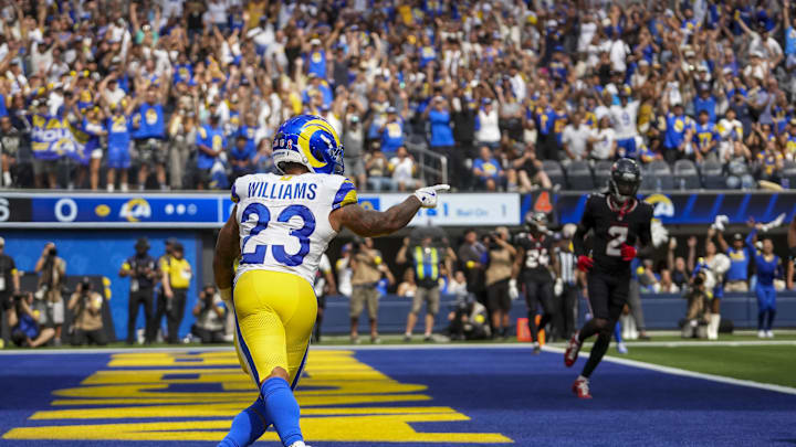 Sep 7, 2025; Inglewood, California, USA; Los Angeles Rams running back Kyren Williams (23) celebrates after scoring a touchtown during the second quarter at SoFi Stadium. Mandatory Credit: Kirby Lee-Imagn Images