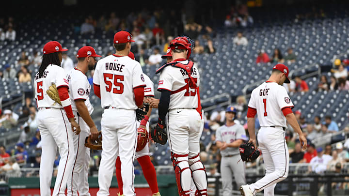 Aug 21, 2025; Washington, District of Columbia, USA; Washington Nationals starting pitcher MacKenzie Gore (1) is removed from the game by interim manager Miguel Cairo (22) against the New York Mets during the fifth inning  at Nationals Park. 