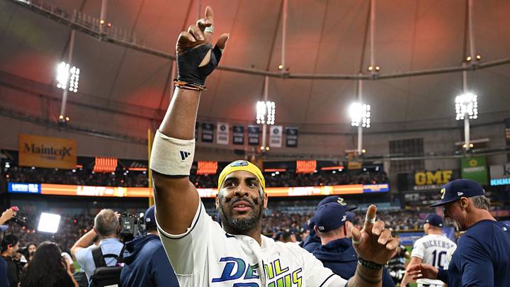 Oct 19, 2026; St. Petersburg, Florida, USA;  Tampa Bay Rays designated hitter Yandy Diaz (2) celebrates after defeating the Cleveland Guardians in game six of the ALCS for the 2026 MLB Playoffs at Tropicana Field.  Mandatory Credit: Jonathan Dyer-Imagn Images