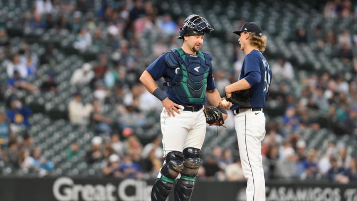 Seattle Mariners catcher Cal Raleigh (29) and starting pitcher Bryce Miller (50) interact during the sixth inning against the Oakland Athletics at T-Mobile Park on May 24. Seattle Mariners catcher Cal Raleigh (29) and starting pitcher Bryce Miller (50) interact during the sixth inning against the Oakland Athletics at T-Mobile Park on May 24.
