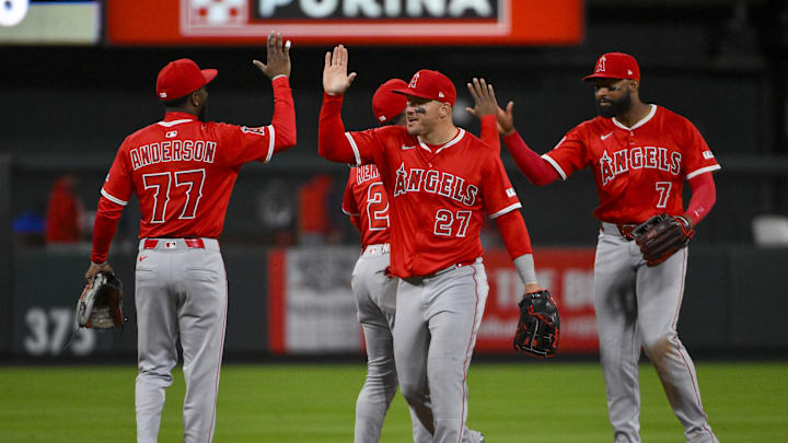 Apr 1, 2025; St. Louis, Missouri, USA; Los Angeles Angels right fielder Mike Trout (27) shortstop Tim Anderson (77) second baseman Luis Rengifo (2) and center fielder Jo Adell (7) celebrate after the Angels defeated the St. Louis Cardinals in 11 innings at Busch Stadium. Mandatory Credit: Jeff Curry-Imagn Images Apr 1, 2025; St. Louis, Missouri, USA; Los Angeles Angels right fielder Mike Trout (27) shortstop Tim Anderson (77) second baseman Luis Rengifo (2) and center fielder Jo Adell (7) celebrate after the Angels defeated the St. Louis Cardinals in 11 innings at Busch Stadium. Mandatory Credit: Jeff Curry-Imagn Images