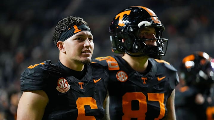 Tennessee quarterback Joey Aguilar (6) and Tennessee tight end Miles Kitselman (87) walk towards the locker room after a NCAA football game between the Tennessee Volunteers and Oklahoma Sooners at Neyland Stadium in Knoxville, Tenn., on November 1, 2025. Tennessee quarterback Joey Aguilar (6) and Tennessee tight end Miles Kitselman (87) walk towards the locker room after a NCAA football game between the Tennessee Volunteers and Oklahoma Sooners at Neyland Stadium in Knoxville, Tenn., on November 1, 2025.